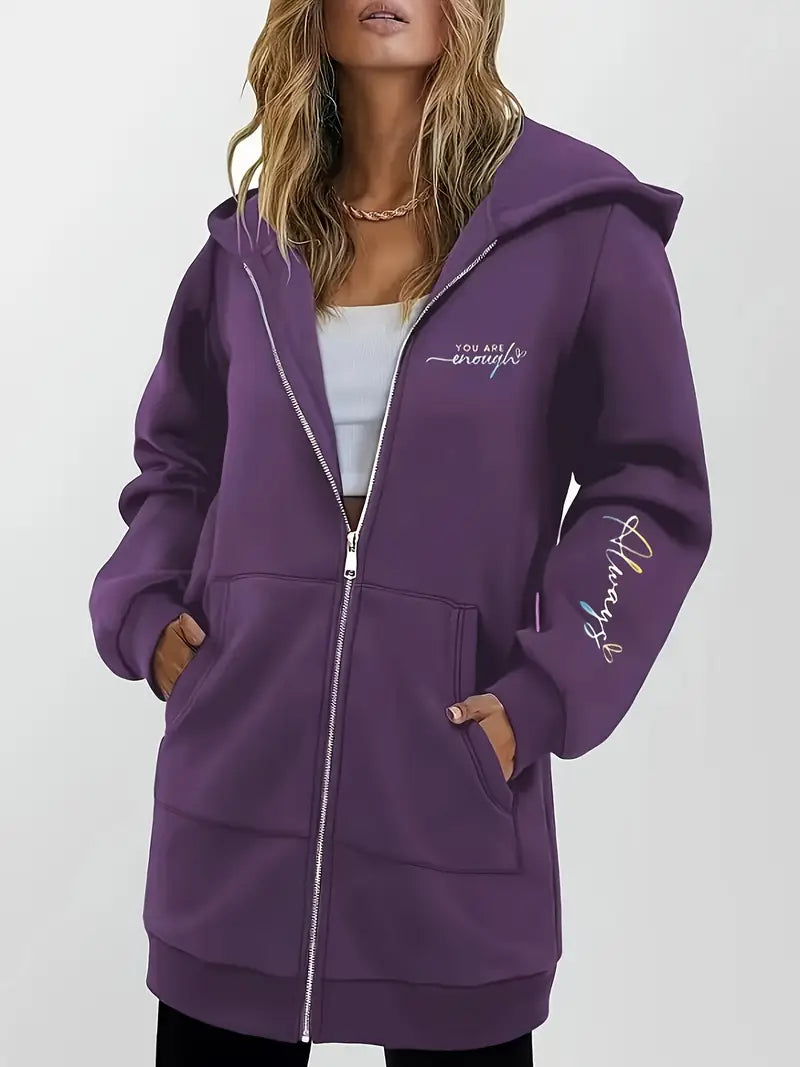 Angeleen – Bunda s kapucí, zipem a geometrickým potiskem.