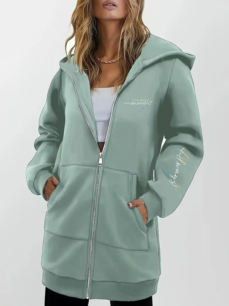 Angeleen – Bunda s kapucí, zipem a geometrickým potiskem.