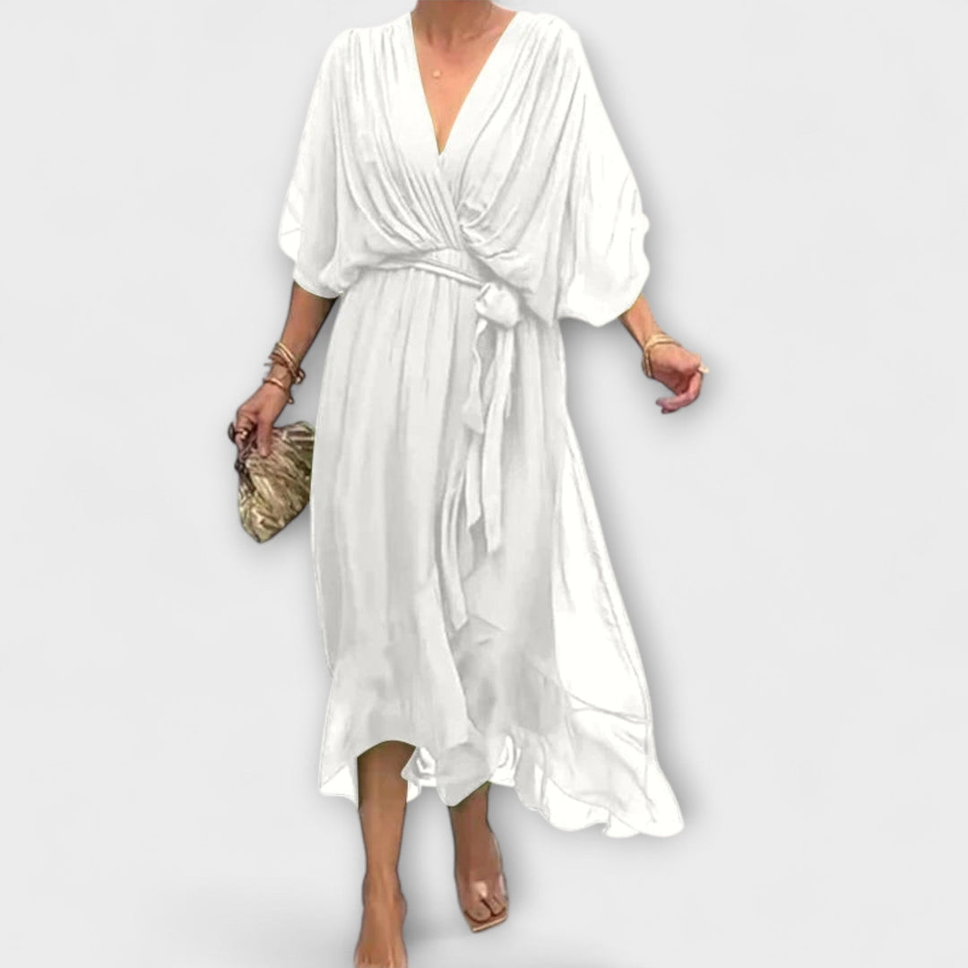 Iveta - Lehká midi šaty s výstřihem do V a páskem na zavazování.