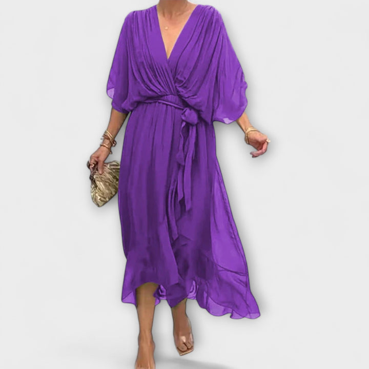 Iveta - Lehká midi šaty s výstřihem do V a páskem na zavazování.