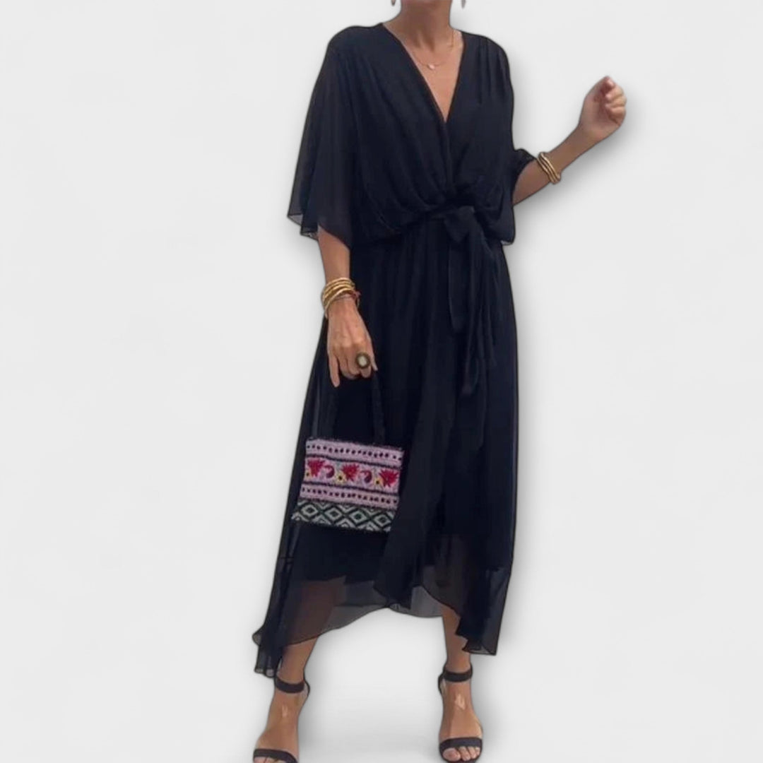 Iveta - Lehká midi šaty s výstřihem do V a páskem na zavazování.