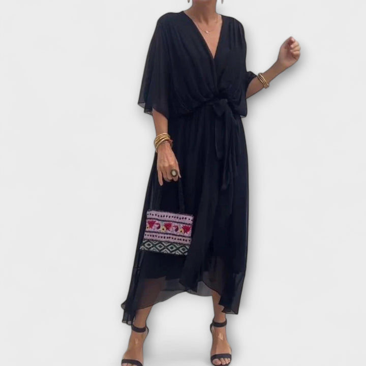 Iveta - Lehká midi šaty s výstřihem do V a páskem na zavazování.