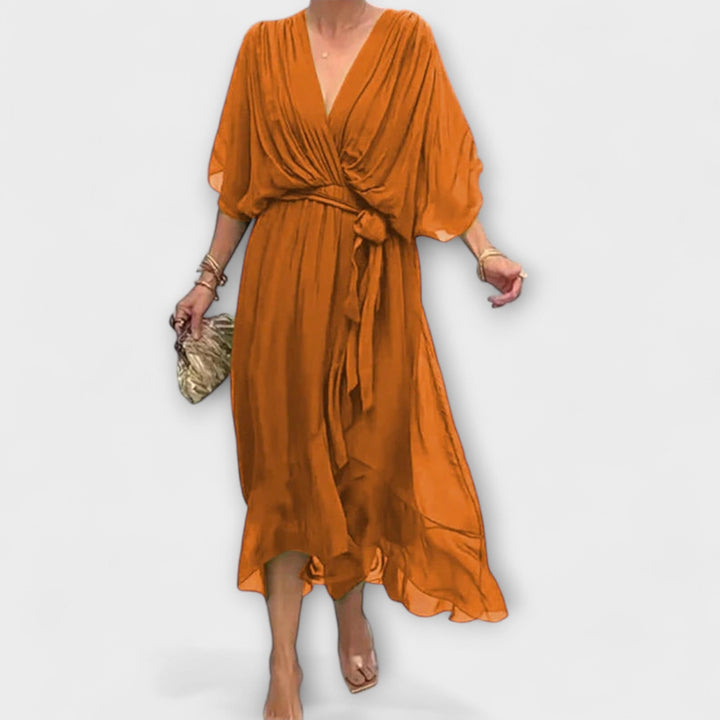 Iveta - Lehká midi šaty s výstřihem do V a páskem na zavazování.